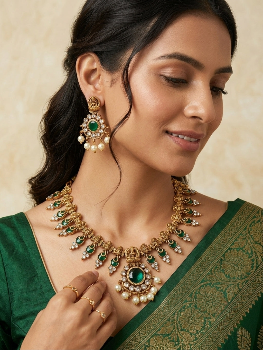Gold-Plated Green Stone and kundan Studded Lakshmi Temple Necklace Jewellery Set
