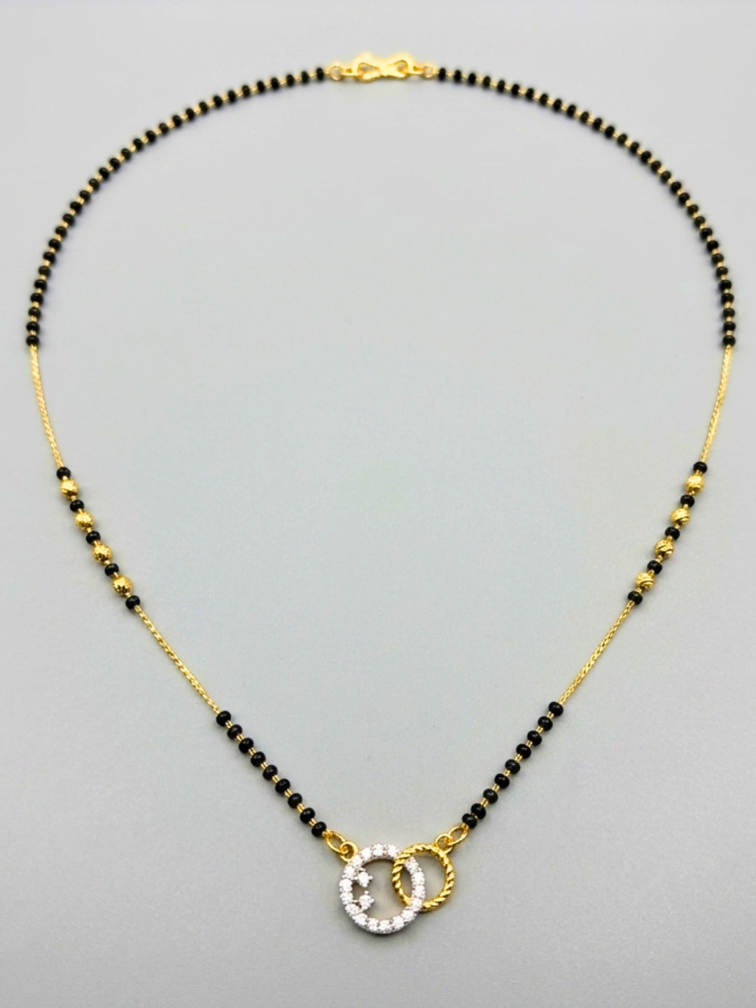 Gold-Plated American Diamond Interlinked Rings Mangalsutra Necklace