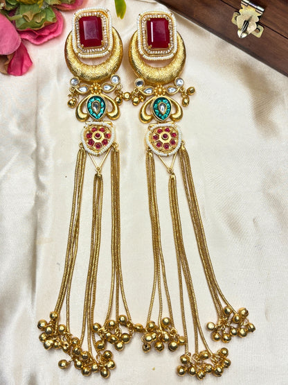 Gold-Toned Green Stone Embellished Kundan Tassel Drop Earrings