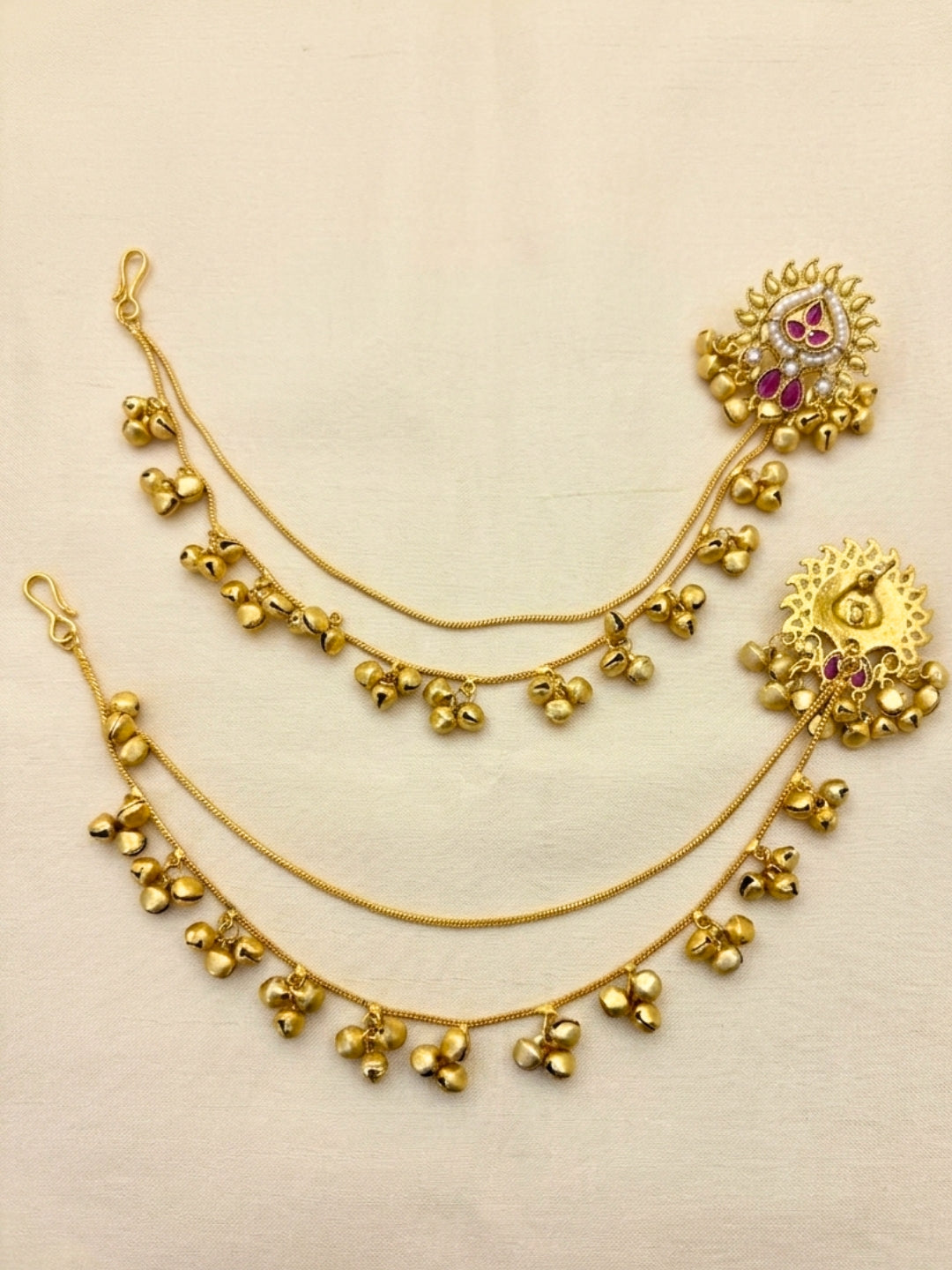 Women Gold-Plated Kundan Studded Earrings with Hair Chain