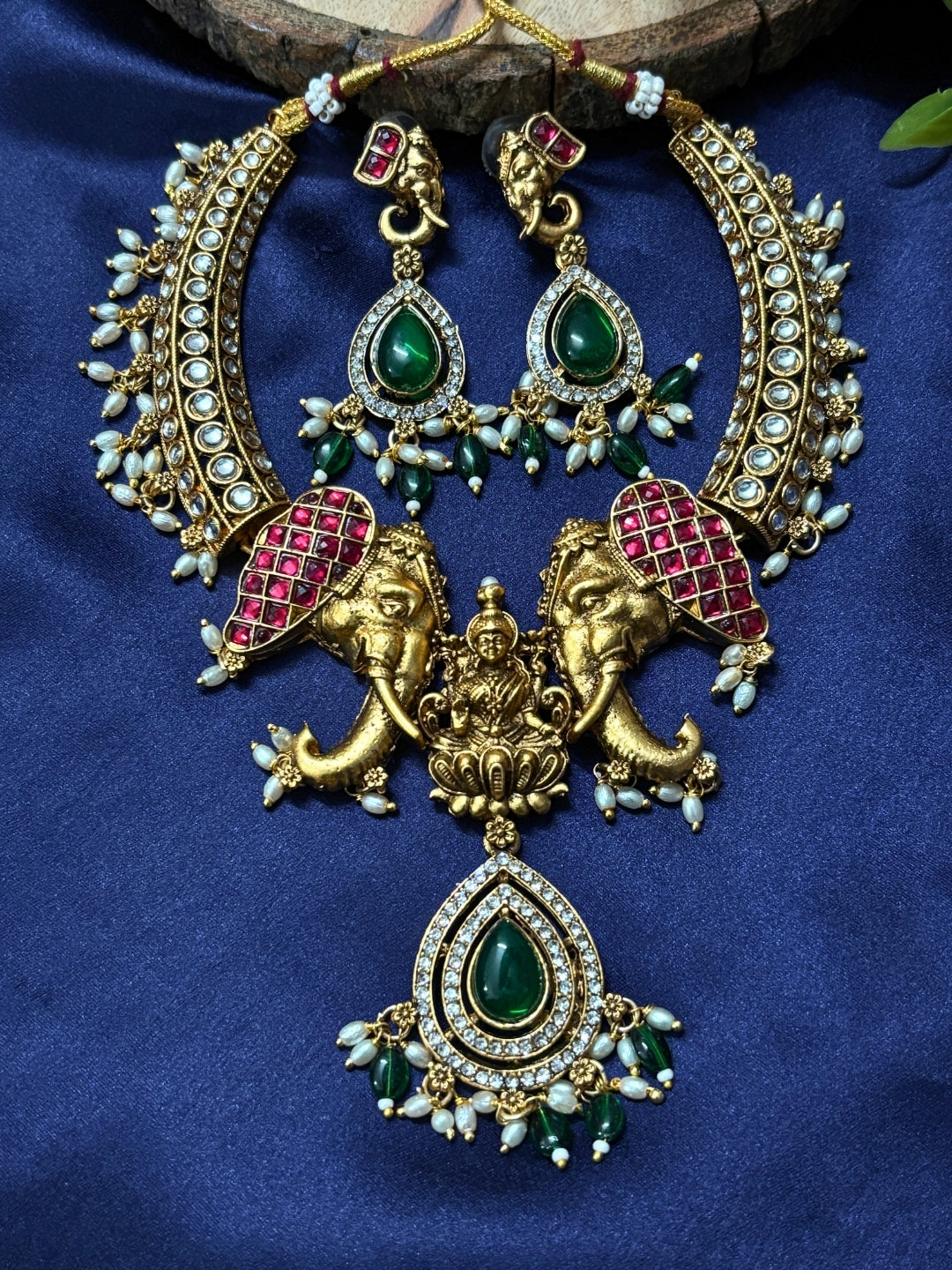 Gold-Plated Green Stone-Studded Temple Hasli Necklace Jewellery Set