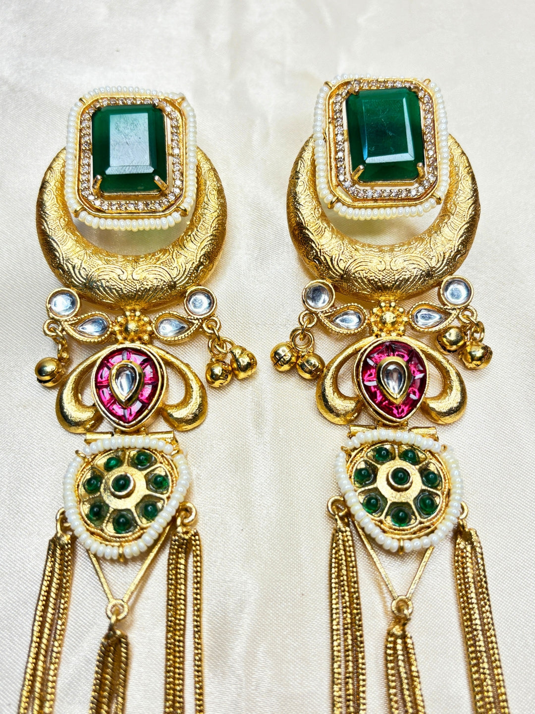Gold-Toned Green Stone Embellished Kundan Tassel Drop Earrings