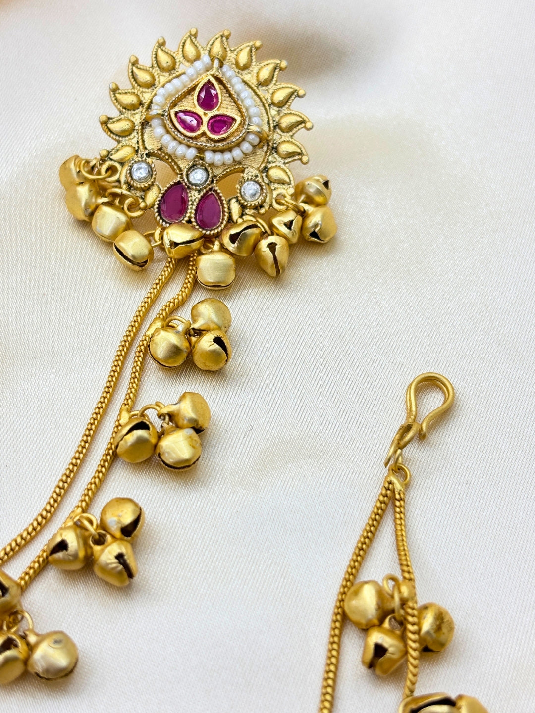 Women Gold-Plated Kundan Studded Earrings with Hair Chain