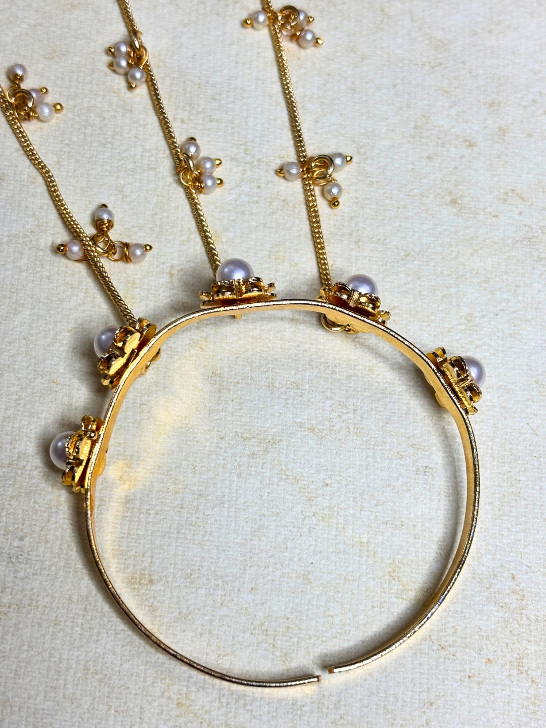 Gold-Plated Pearls Studded Ghungaroo Hath Phool  Kashmiri Ring Bracelet set