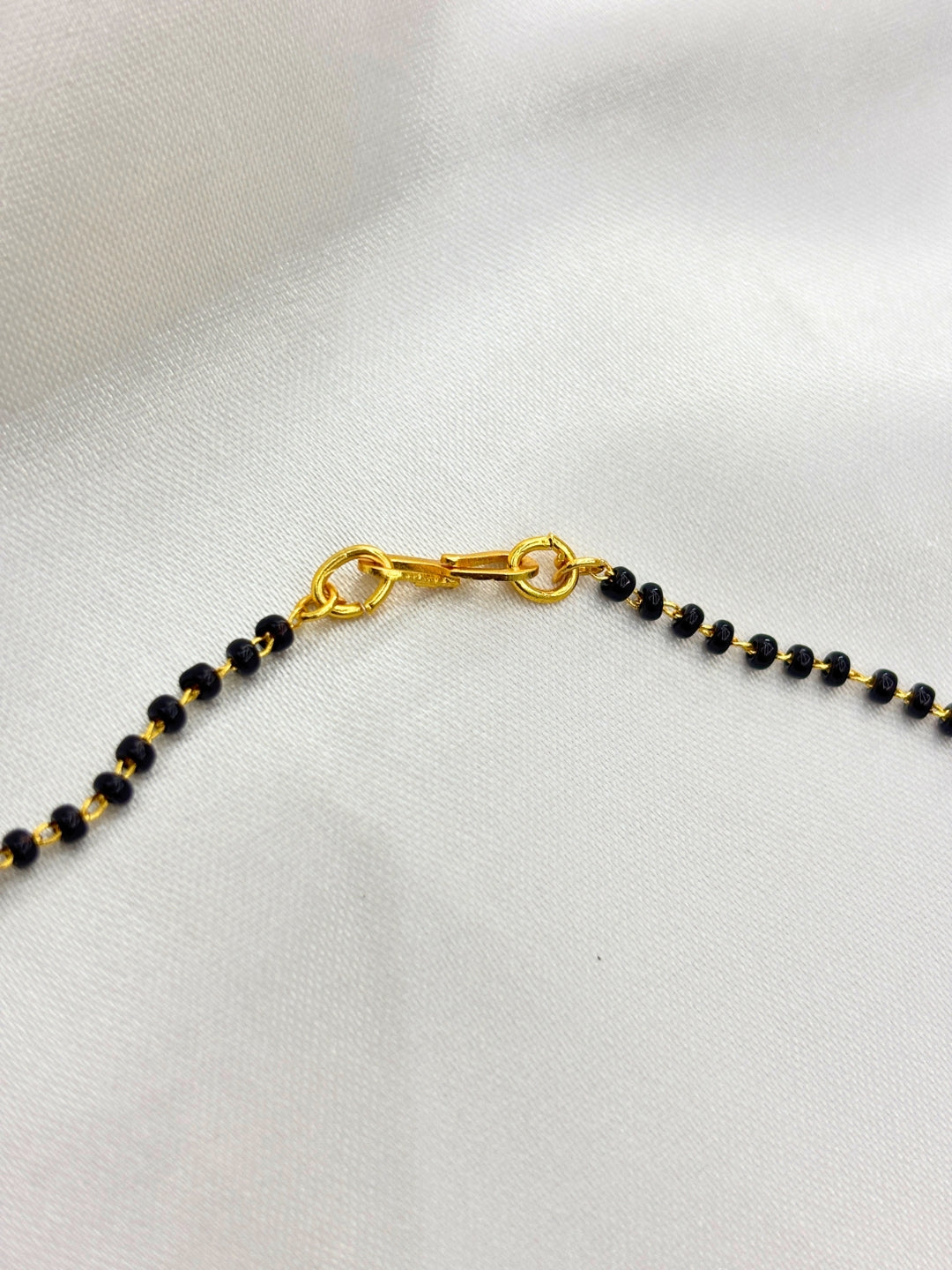 Gold-Plated American Diamond Interlinked Rings Mangalsutra Necklace