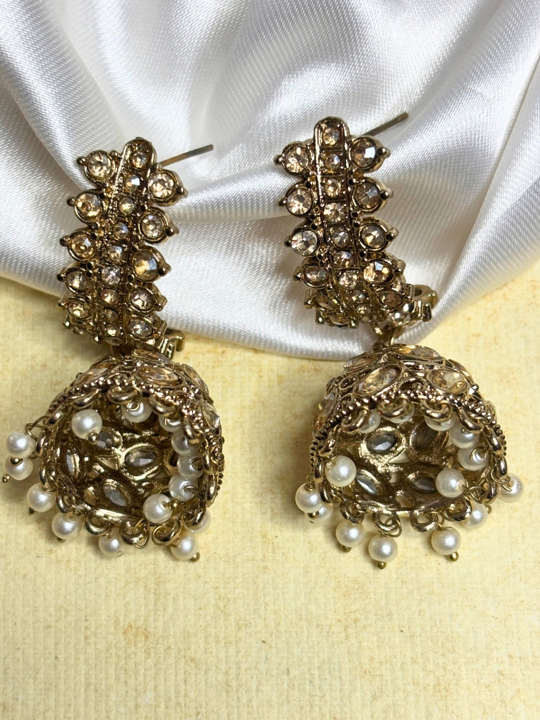 Gold-Plated  Kundan & Pearl Studded Layered  Jhumka Earrings