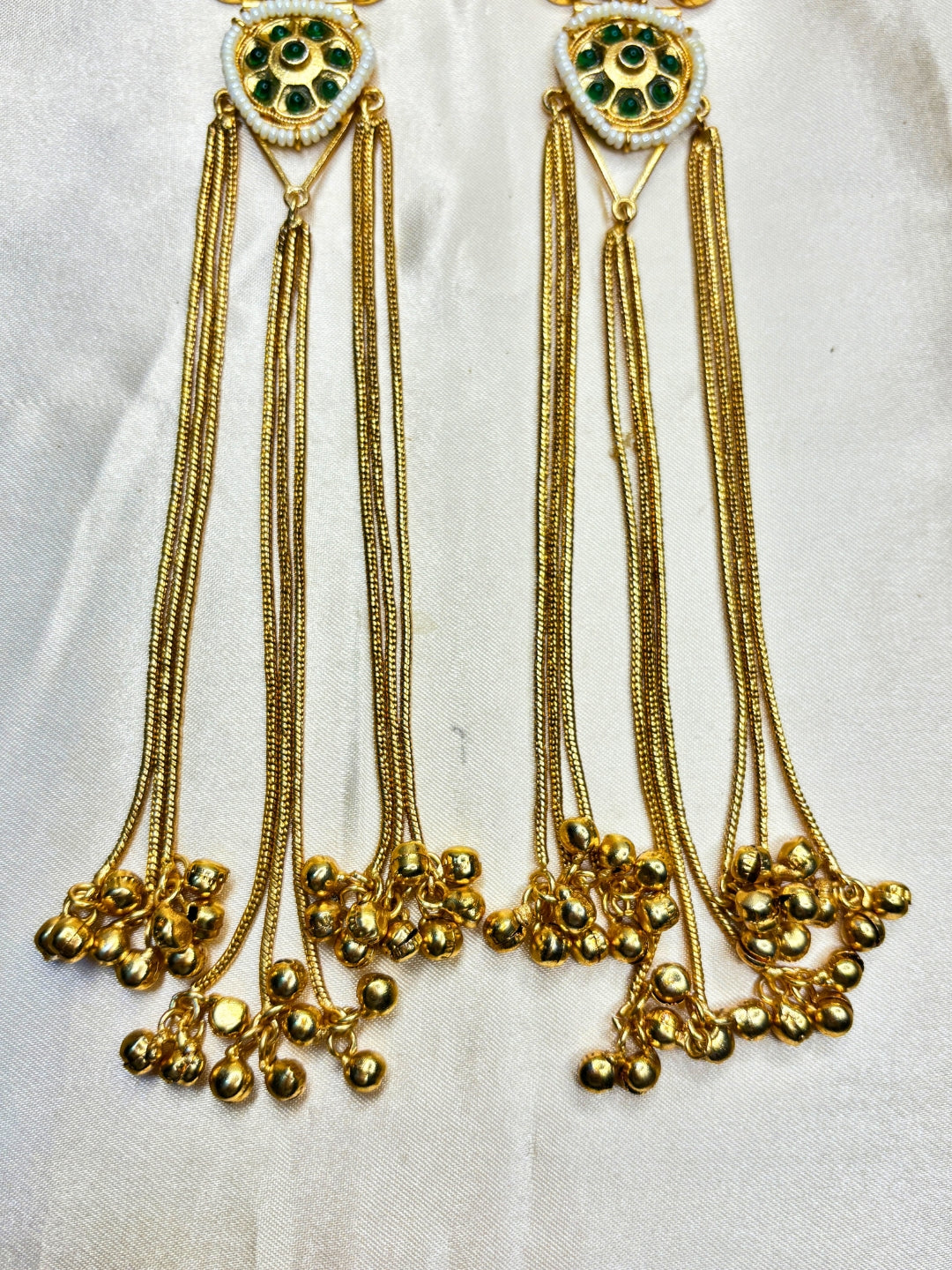 Gold-Toned Green Stone Embellished Kundan Tassel Drop Earrings