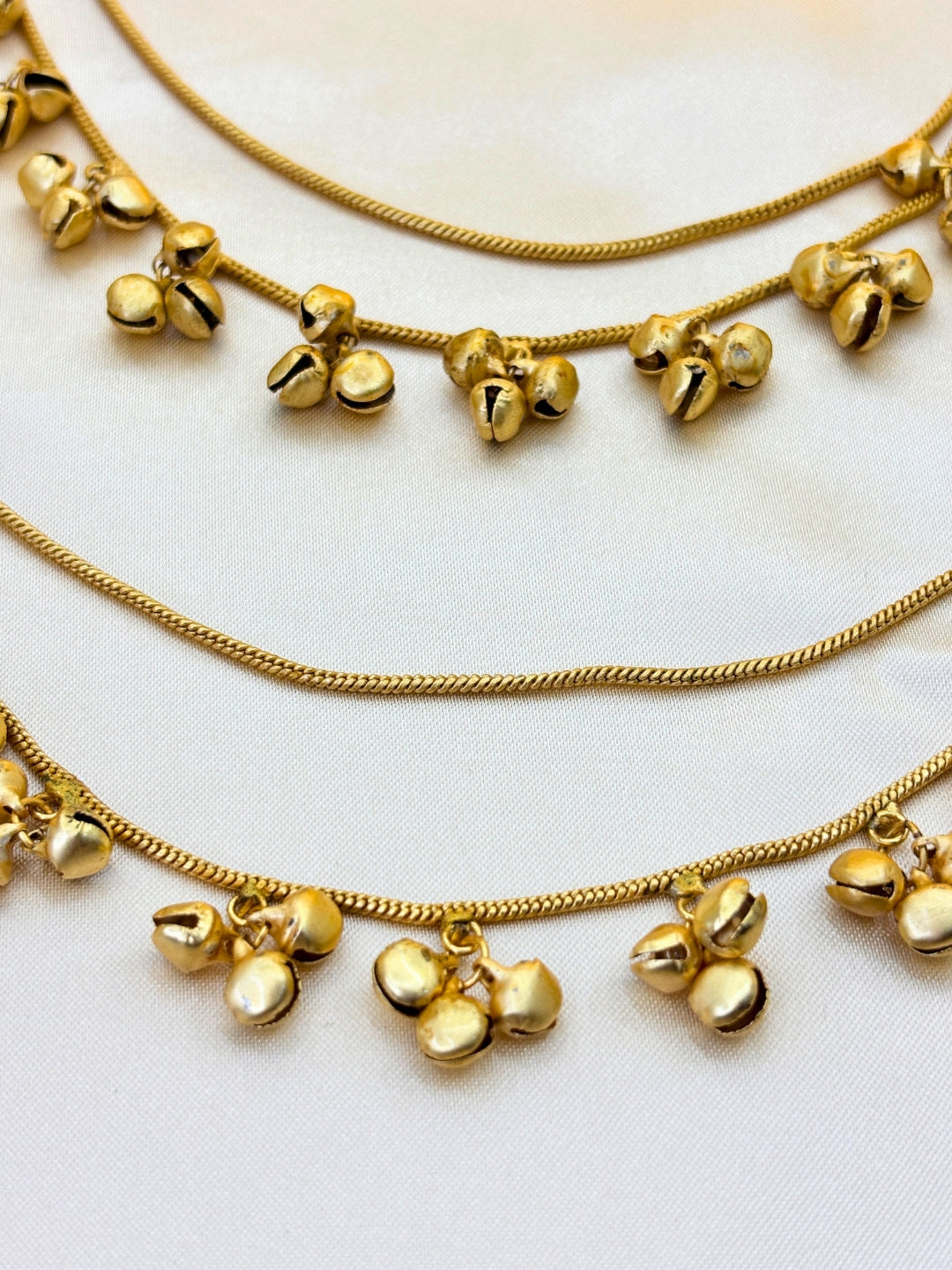 Women Gold-Plated Kundan Studded Earrings with Hair Chain