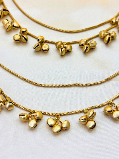 Women Gold-Plated Kundan Studded Earrings with Hair Chain