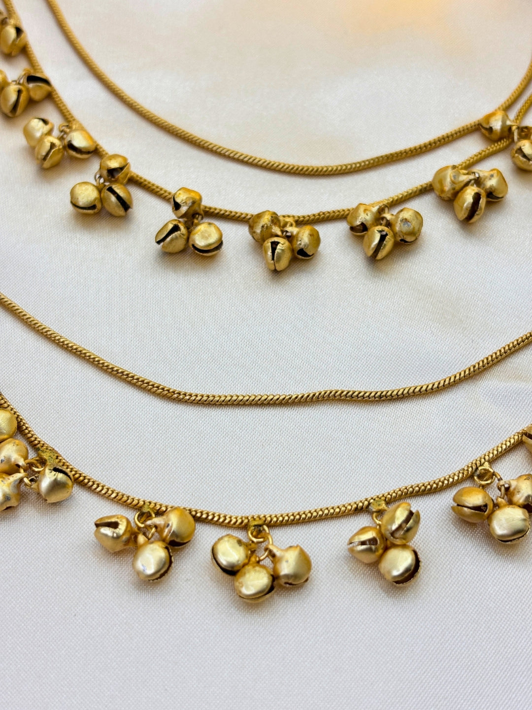 Women Gold-Plated Kundan Studded Earrings with Hair Chain
