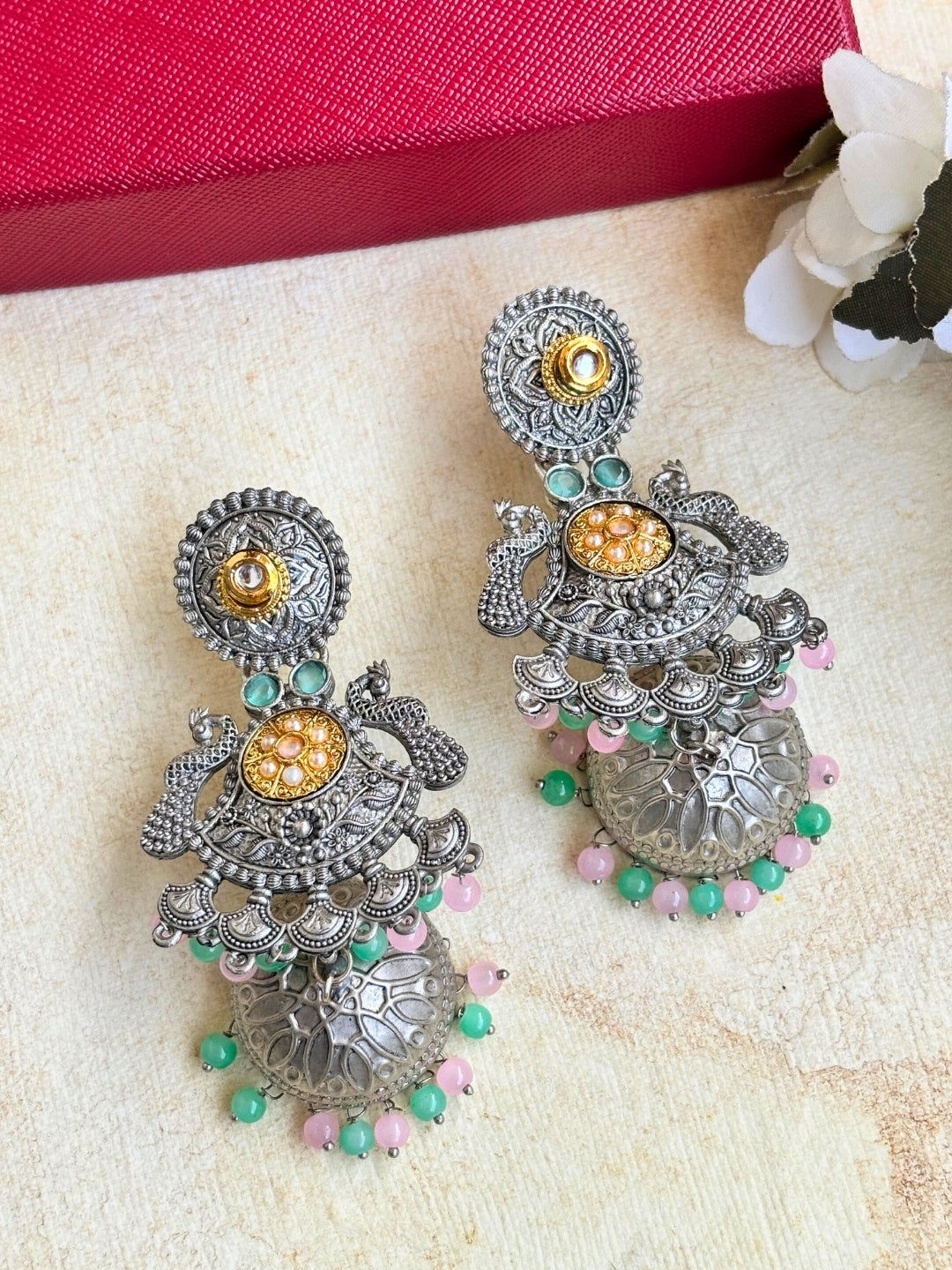 Oxidised Silver Plated Peacock Shaped Jhumkas Earrings (Pink & Mint)