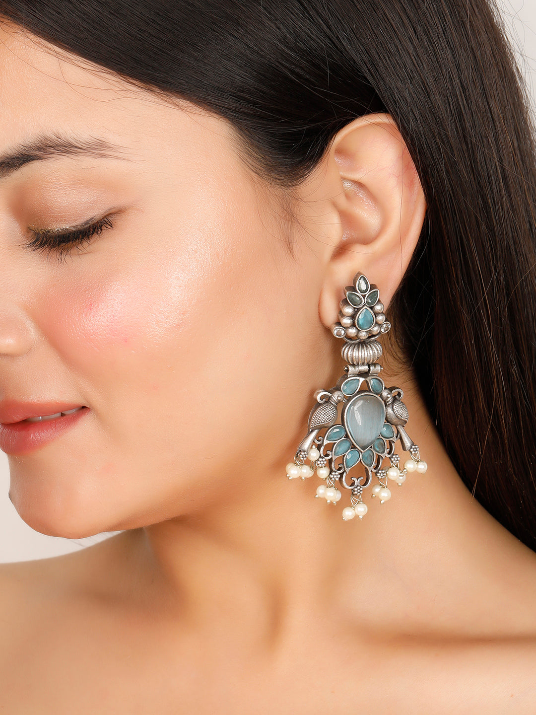 VIVAZS Silver-Plated Peacock Shaped Contemporary Drop Earrings