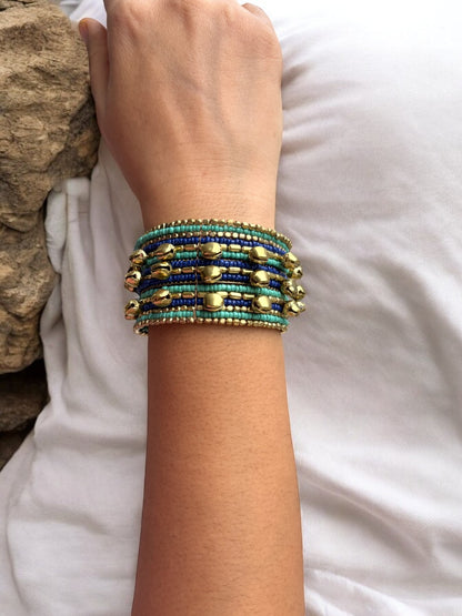 VIVAZS Shimmering Turquoise Blue and Golden Bangle with Ghungroo